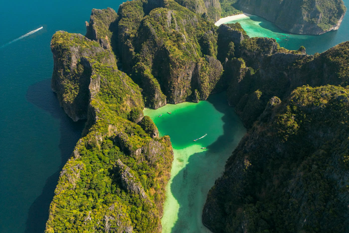 Limestone islands and a turquoise lagoon in the Andaman Sea